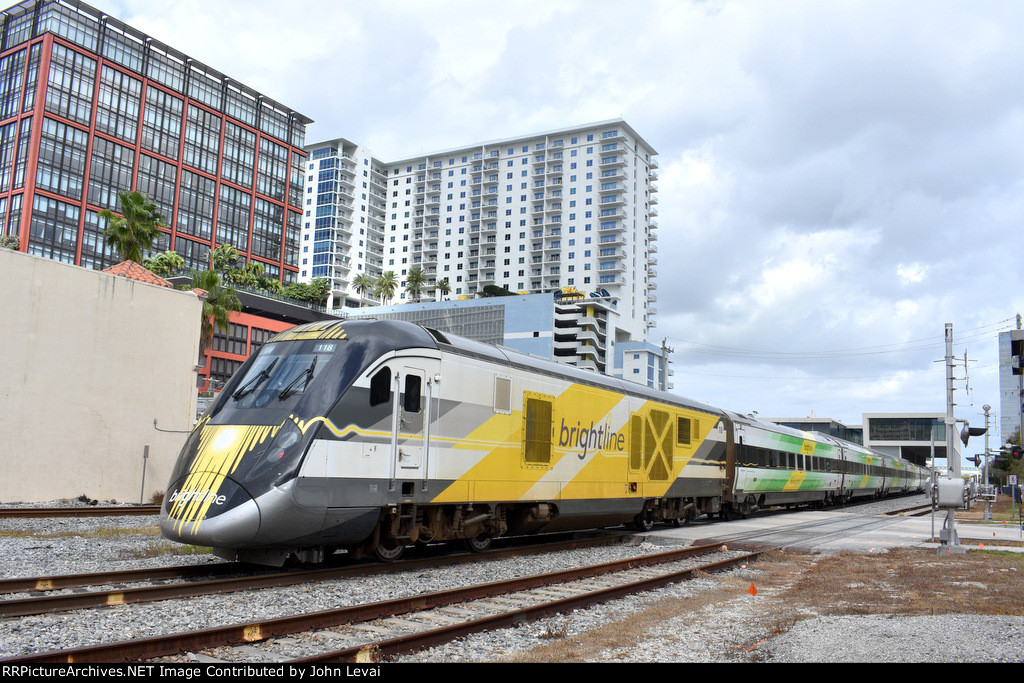 Charger # 118 pushes the Brightline consist into WPB Depot 